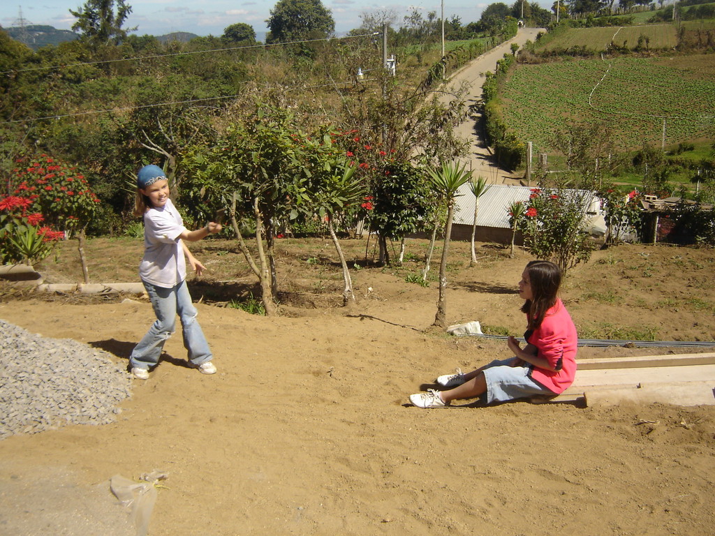 madi & brooke playing stickball in buena vista