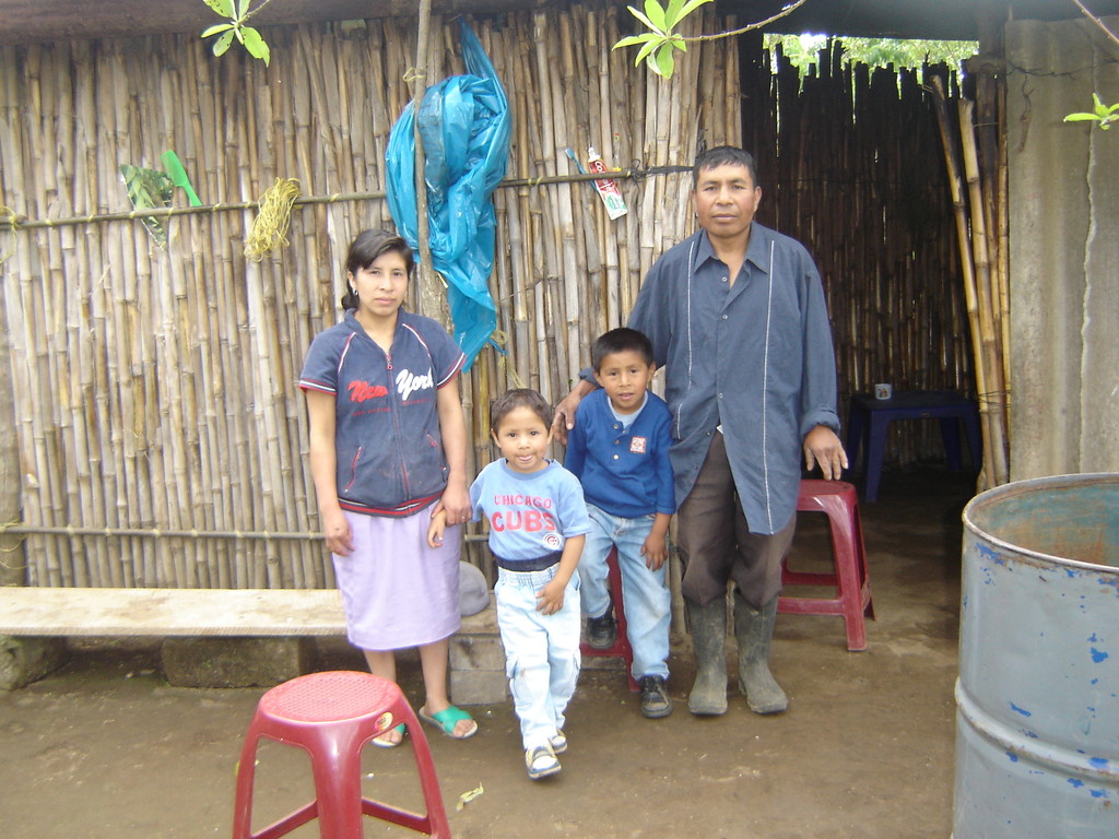 Ixcajoc's in front of old home