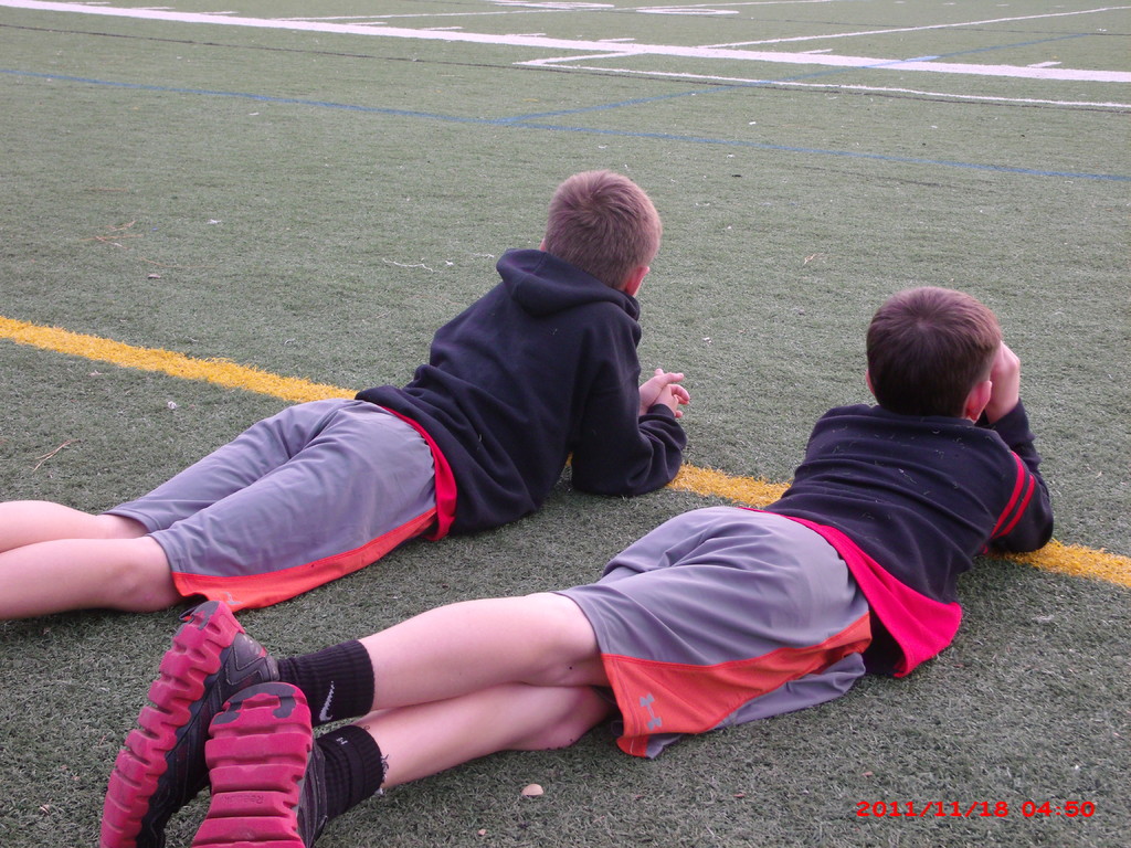 US trip: jake and connor watching taylor's soccer game