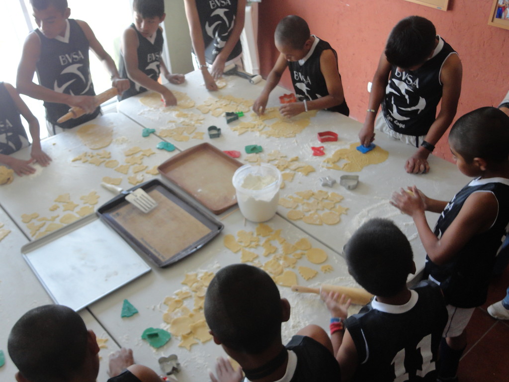 JV rhinos making christmas cookies