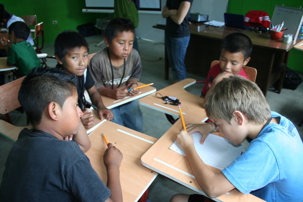 jake in class with his buds at the academy