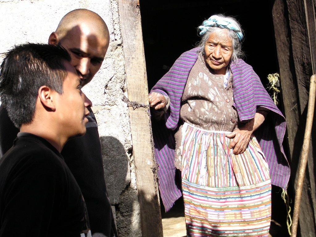 rhino boys giving out food baskets to widows in the community