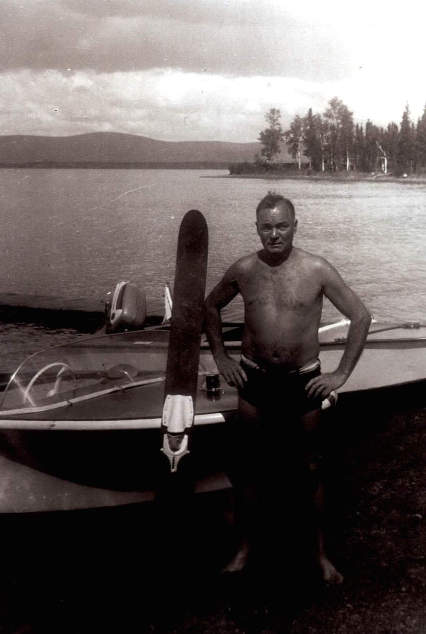 1961 Warren "Tillie" Tilman who owed and subdivided 5 acres in the cove area by the point.  Point where Gordon cabin now sits clearly visible.  The Tilman family still owns property.  