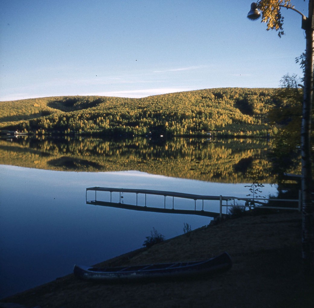 Fall at Harding Lake in 1940's looking south.  Notice not many cabins at end of lake.  Army Camp visible at far left in photo.