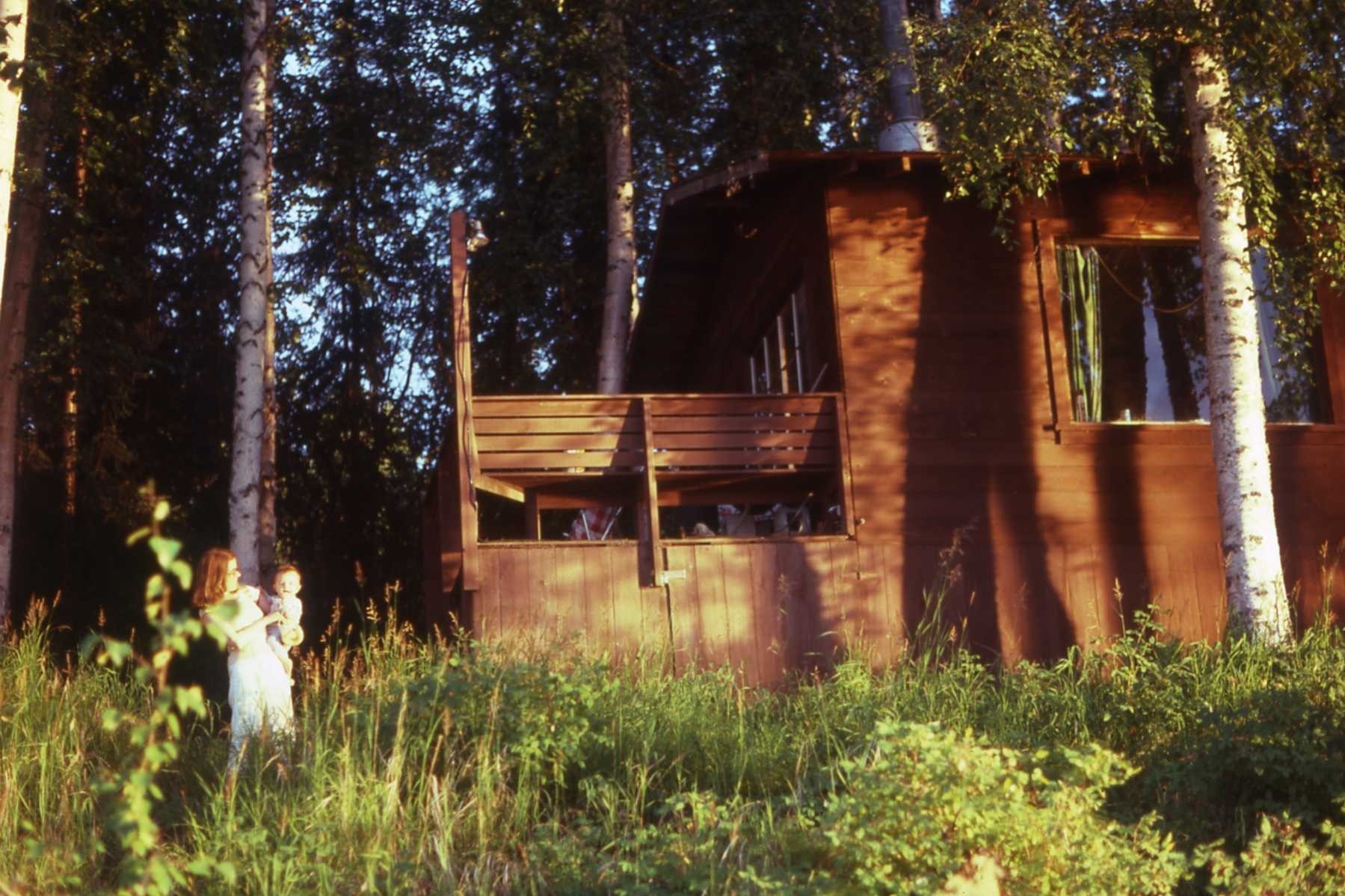 Pat Clasby (Bob’s wife) and their daughter  7 month old Deanna in front of Clasby cabin summer of 1979.  They were living in Juneau at the time and were in Fairbanks for Bob's 20th high school reunion