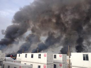 Calais jungle eviction, container camp, fire