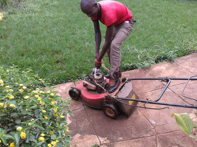 The lawnmower is started by a rope...