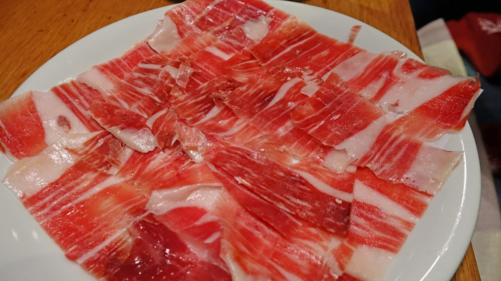 Jambon Bellota tranché main 