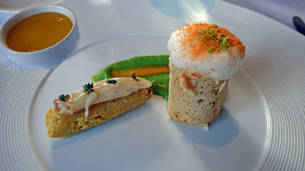 Tourteau frais décortiqué, crème de petits pois, pince au beurre de thym