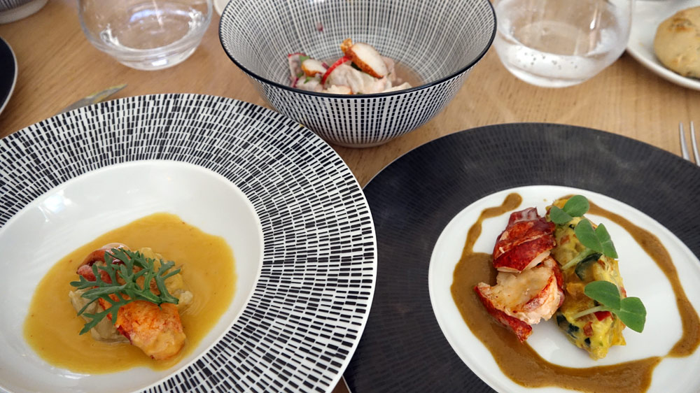 Homard bleu, petits légumes croquants, aïoli au pistou de Longué, ceviche coriandre/citron vert, fondue de fenouil confit, beurre d'orange 