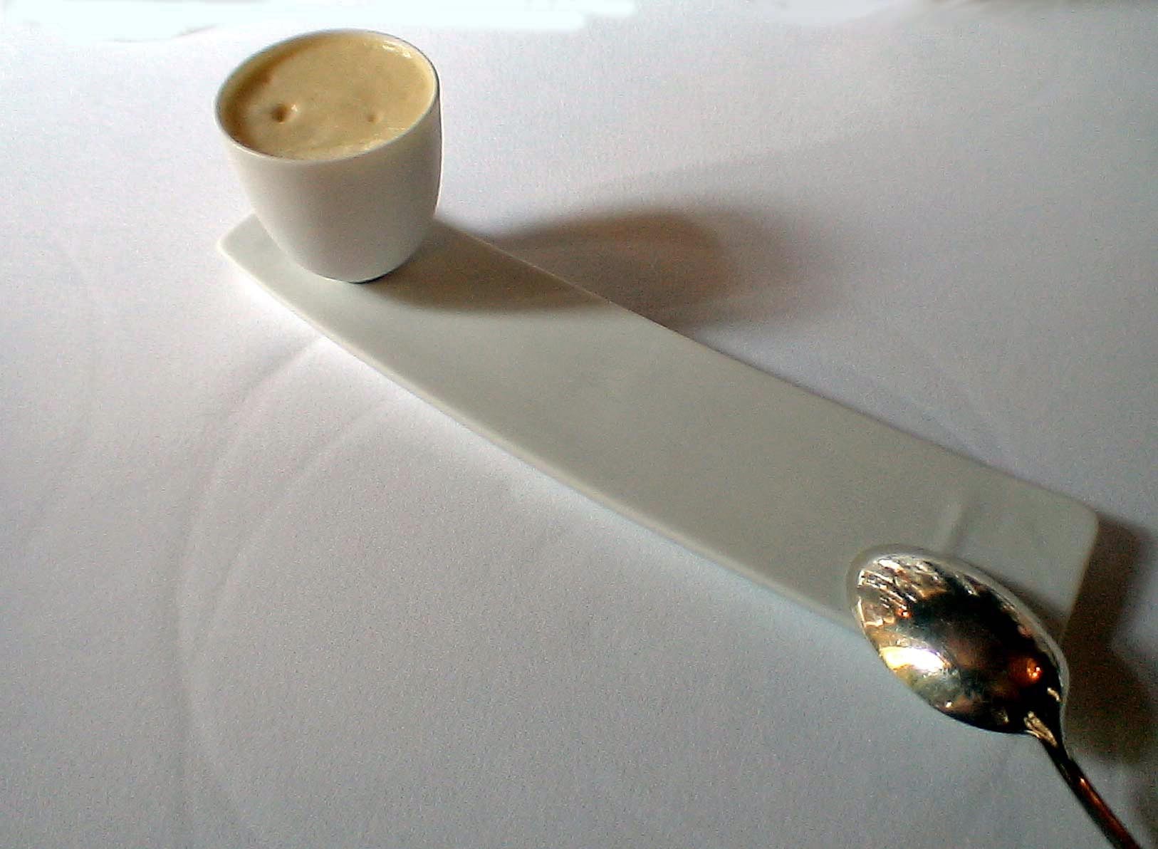 La traditionnelle patience d'Adoménil : Flan de foie gras tiède, nougatine salée et émulsion de Parmesan