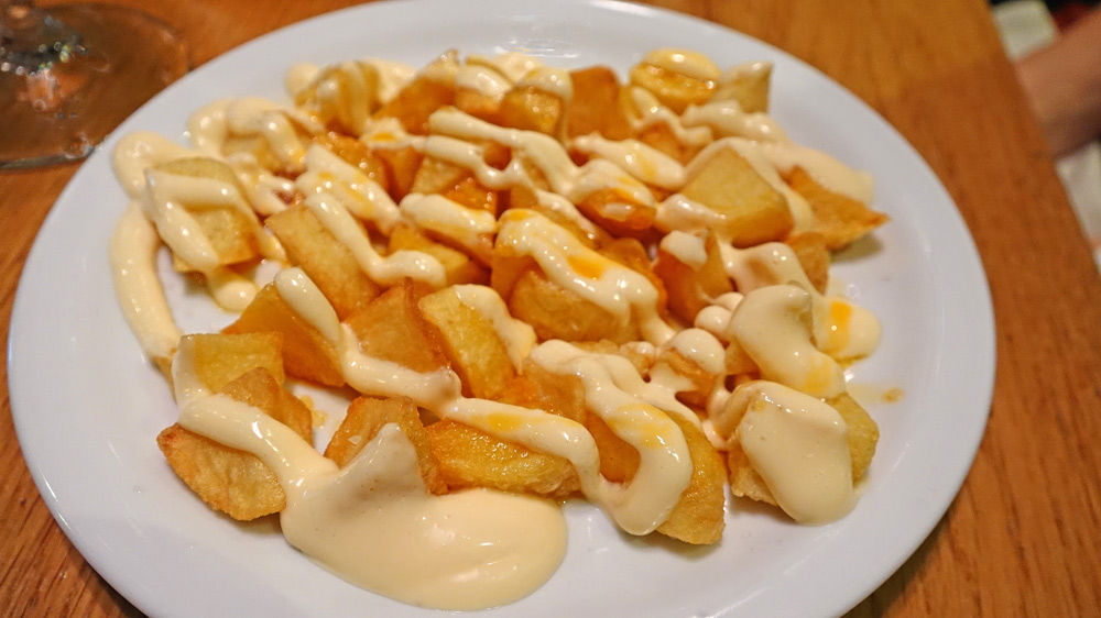 "Patatas bravas" potatoes in a hot sauce