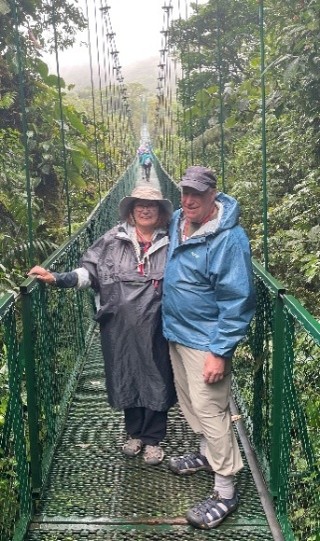 PSC Business Card straddled the hanging bridge in Costa Rica with Juan A and Scott S