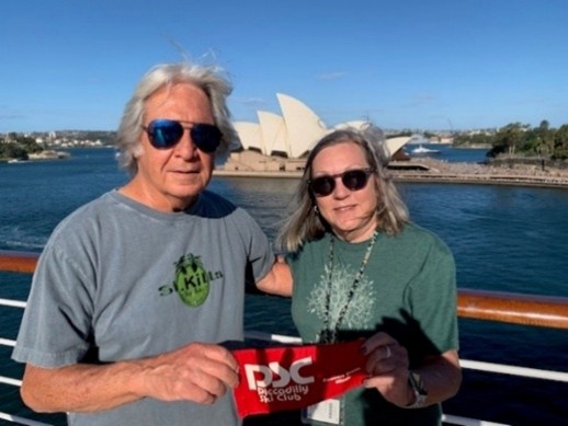 PSC Pole Flag posed in front of Sydney Opera House, Australia with Dave F and Sherri T