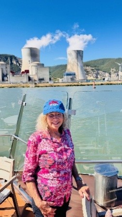 Piccadilly Ball Cap is rolling down the Rhone River past one of France's energy plants just outside of Avignon France with Pam R