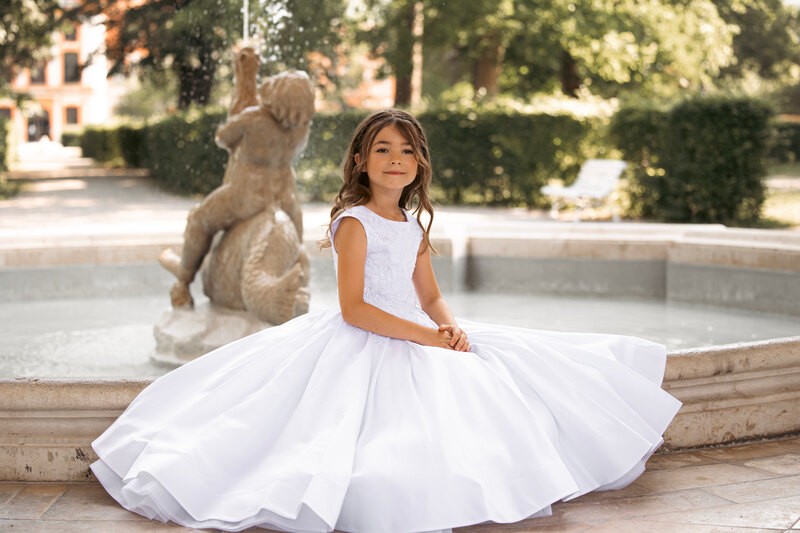 Elegant first holy communion dress with lace.