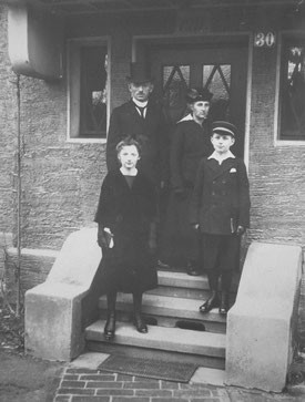 The Frick family in front of their house in Zweibrücken.