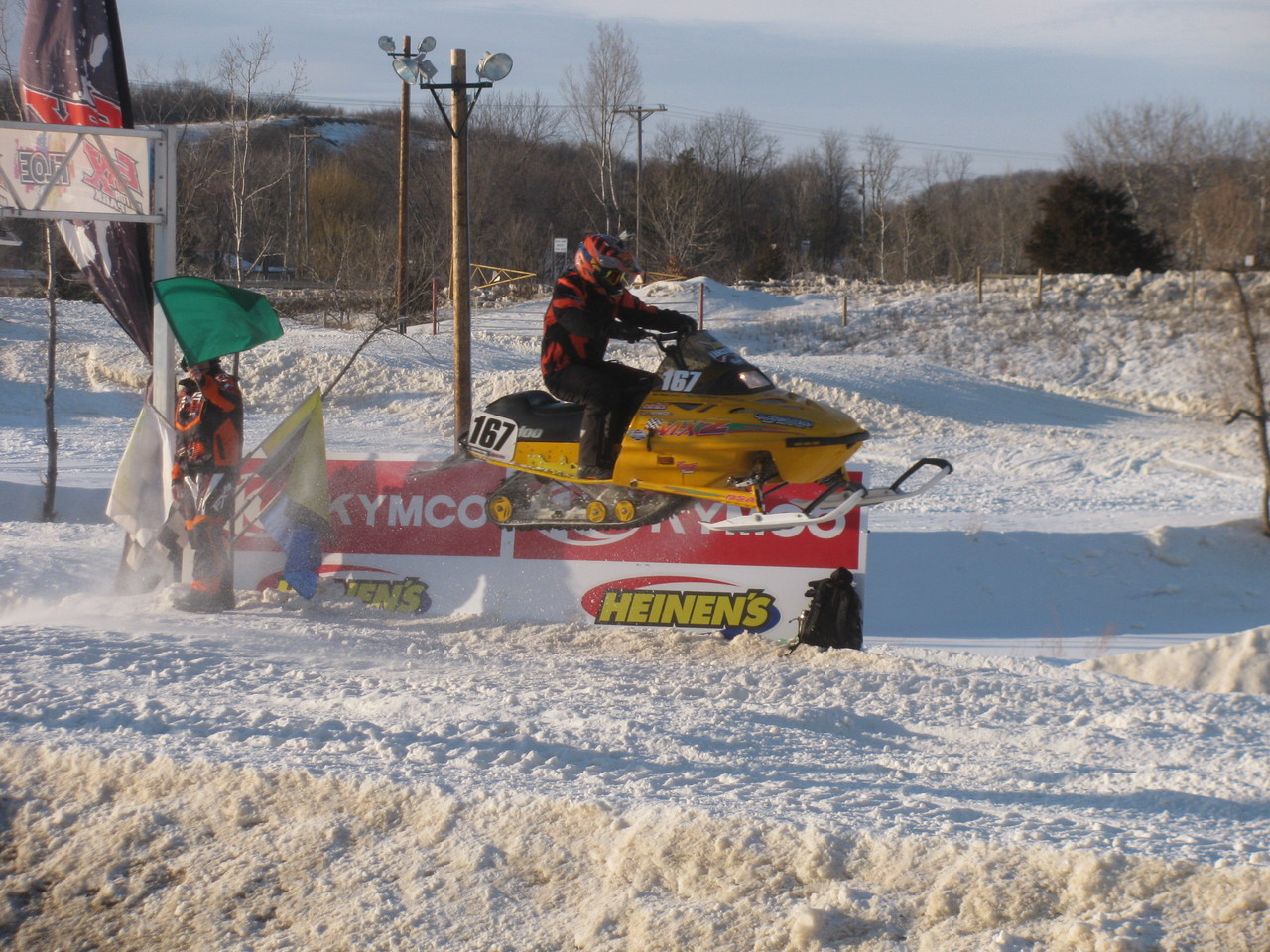 Sam Lungstrom in level flight on the Plasti-Sleeve sponsored #167 Ski-Doo.