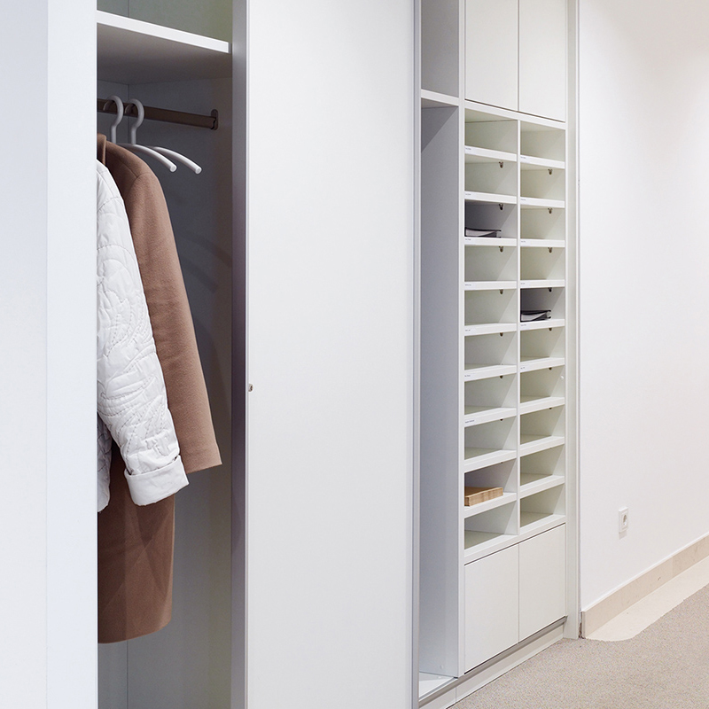 Wardrobe facilities and pigeonholes for mail are optional design features.