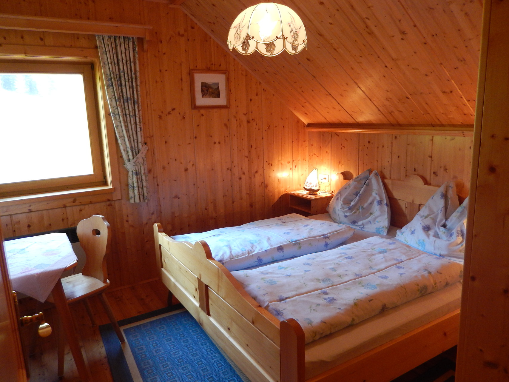 Schlafzimmer 1 von 2 im Kleinen Ferienhaus Koglerhütte