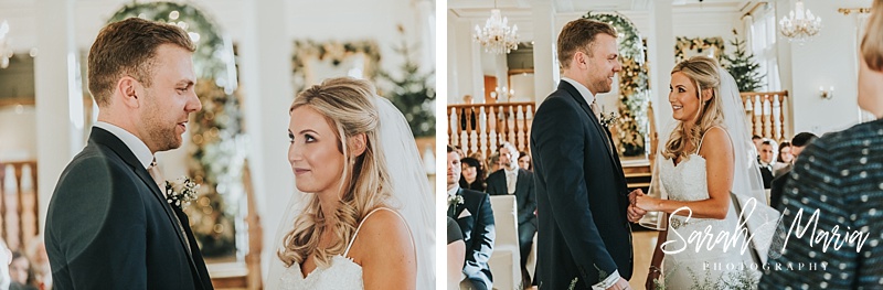 bride and groom smiling at each other during wedding ceremony
