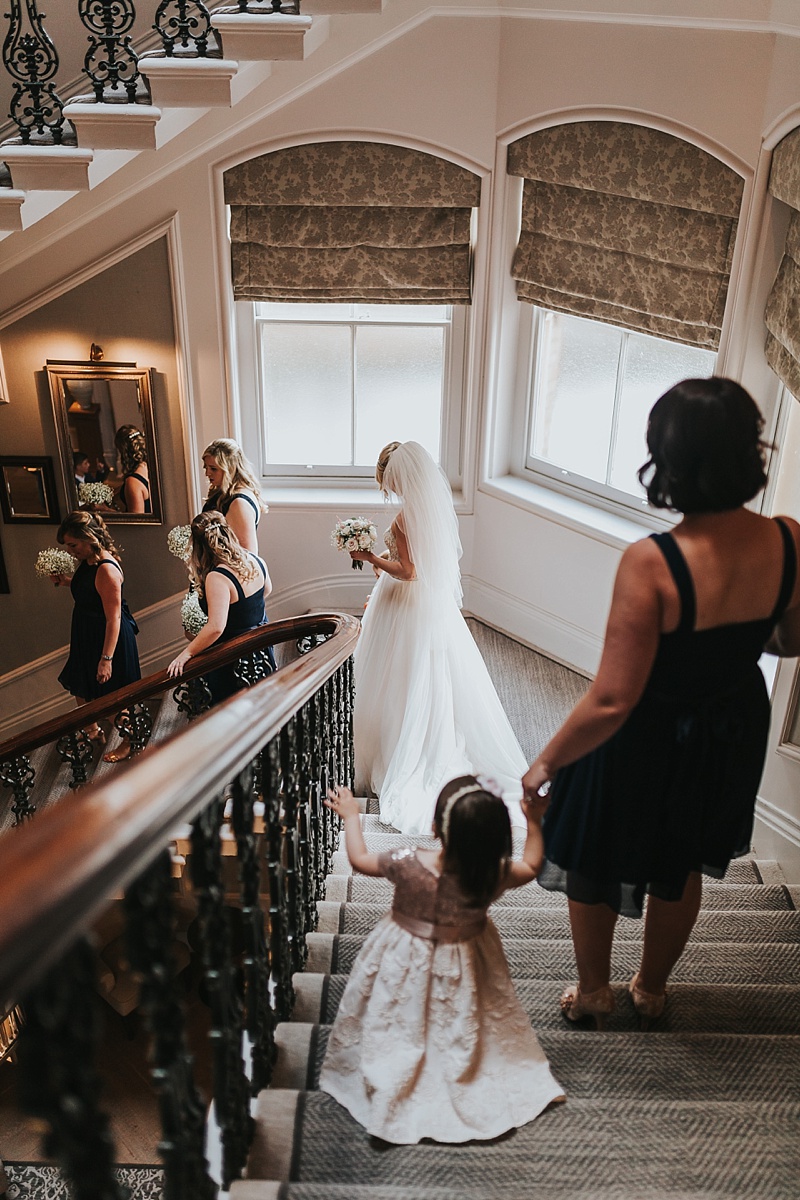 bridal party on the stairs at the principal York hotel