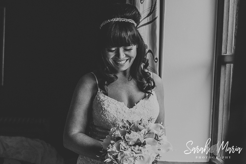 a black and white portrait of a bride in window light at Ferraris country house hotel