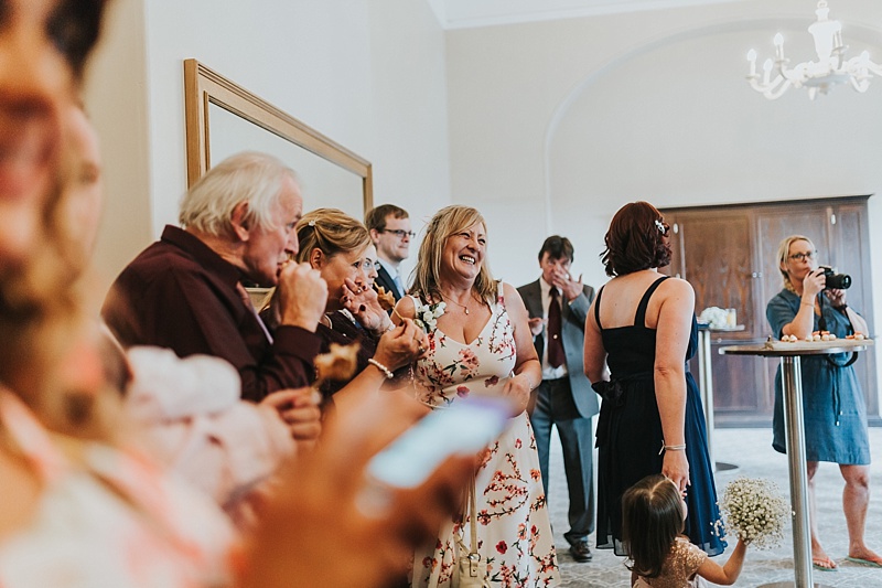 natural shot of a wedding guest