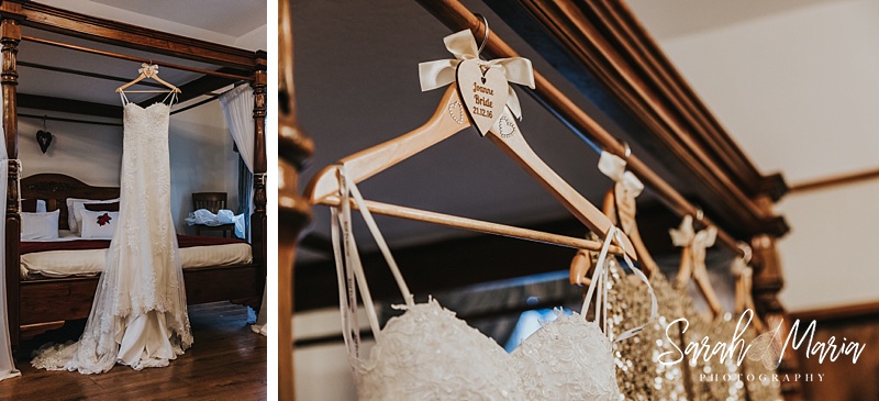 wedding dress hung on a four poster bed