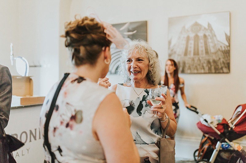 natural shot of a wedding guest at the principal York