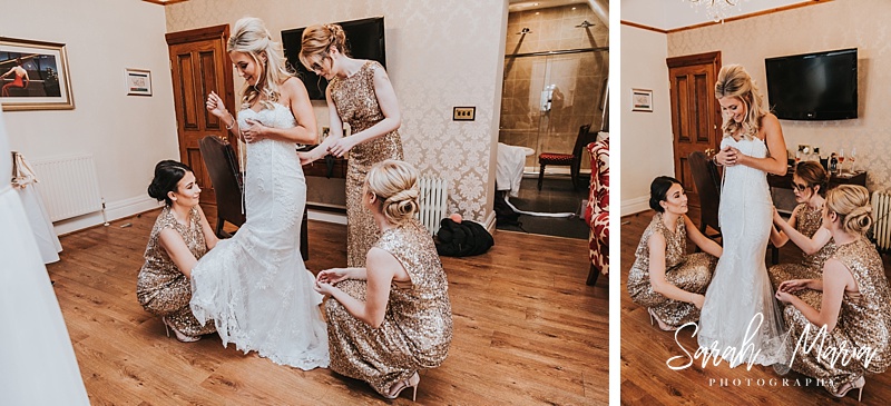 bridesmaids helping a bride into her rosa Clara wedding dress