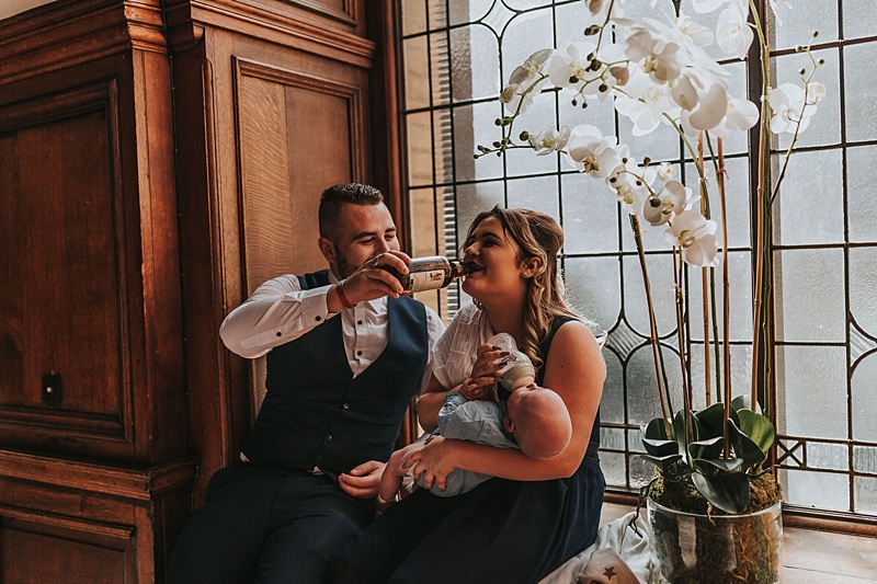 wedding guests feeding a baby
