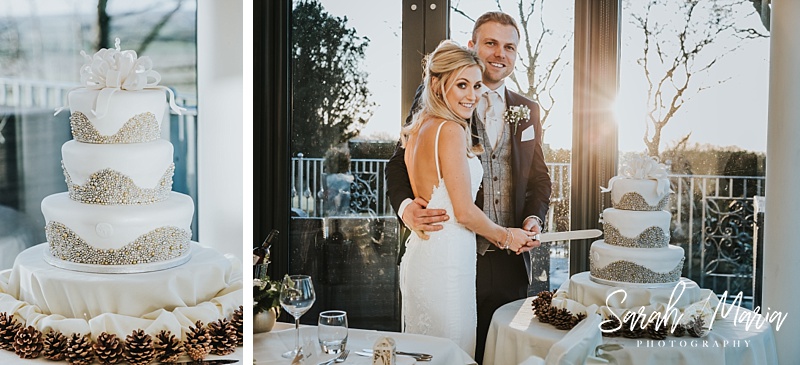 Pinecones with a beaded wedding cake and the bride and groom posing with their wedding cake