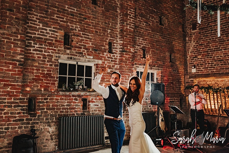 bride and groom dancing in the tithe barn