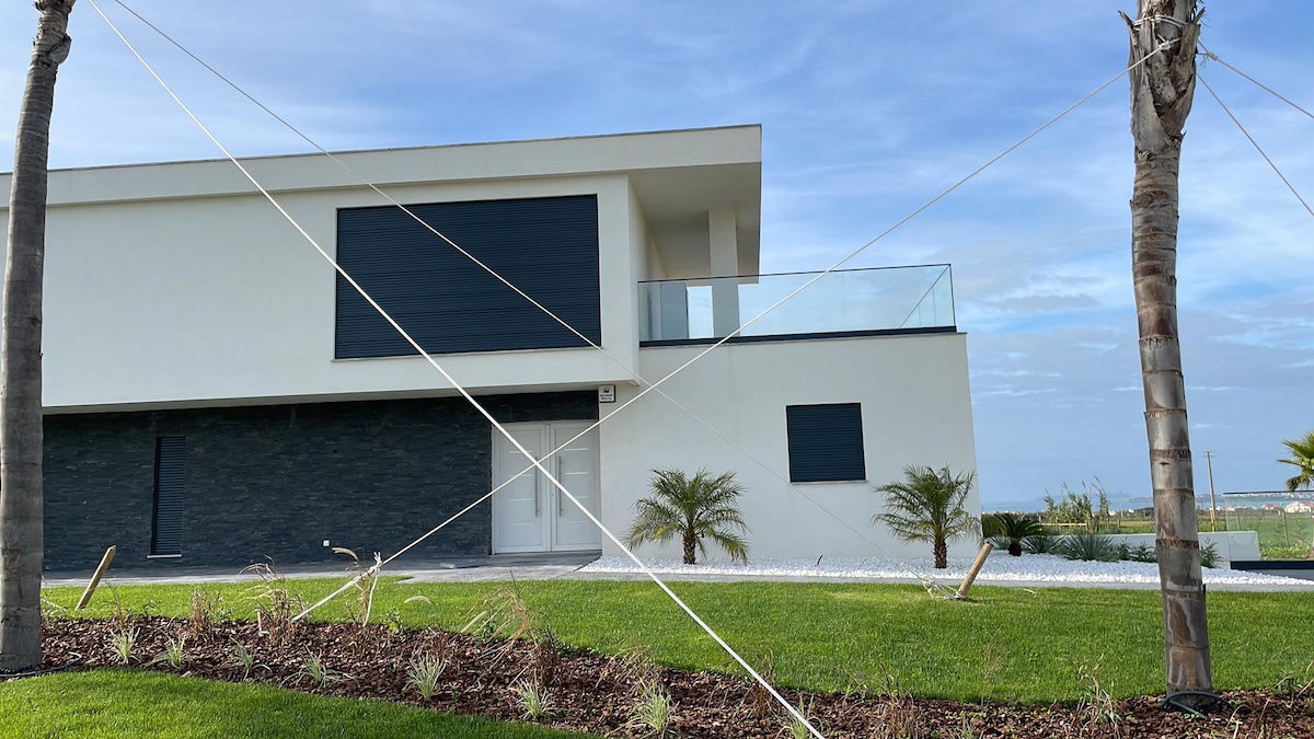 vente immobilier de luxe Portugal Lisbonne maison contemporaine face et vue mer