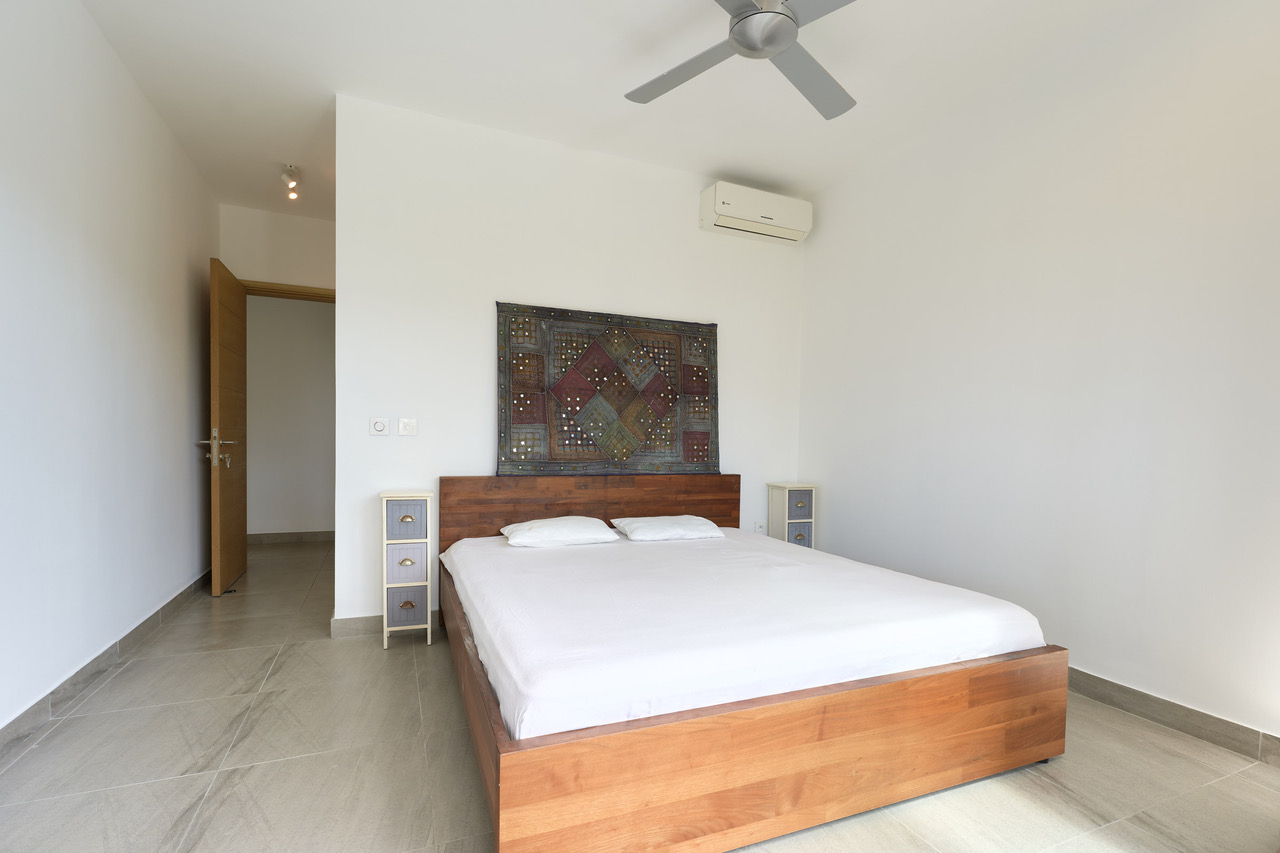Achat et revente appartement T3 Choisy les bains plage à pied JINVESTY île Maurice votre agence immobilière.
