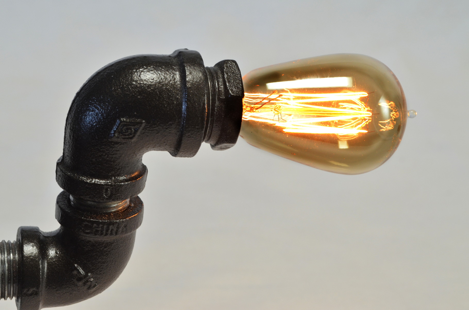 Camelamp's head is a beautiful 40 watt, vintage-style, hand-wound bulb.