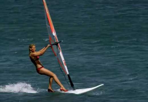 Janni Hönscheid for Reno Tv spot windsurfing with Highheels