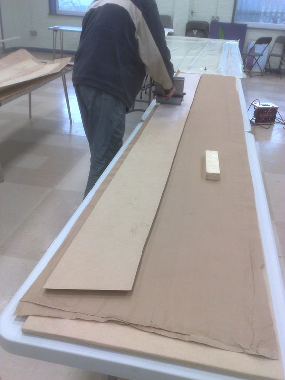 cloaking panel being veneered