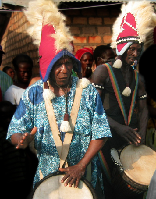 Famoudou Konaté and Sayon Camara in village