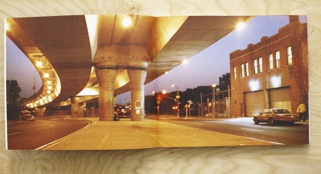 Photograph of a UFO graffiti painting on a highway overpass in Brooklyn.
