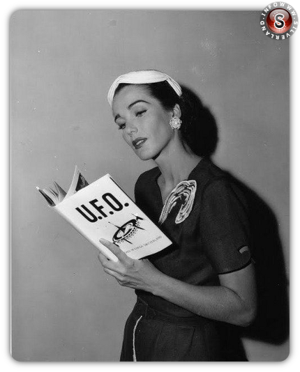 Woman reading book on Unidentified Flying Objects
