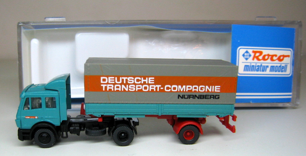 Motrice MB con rimorchio a 2 assi con insegne "Deutsche Transport-Compagnie"