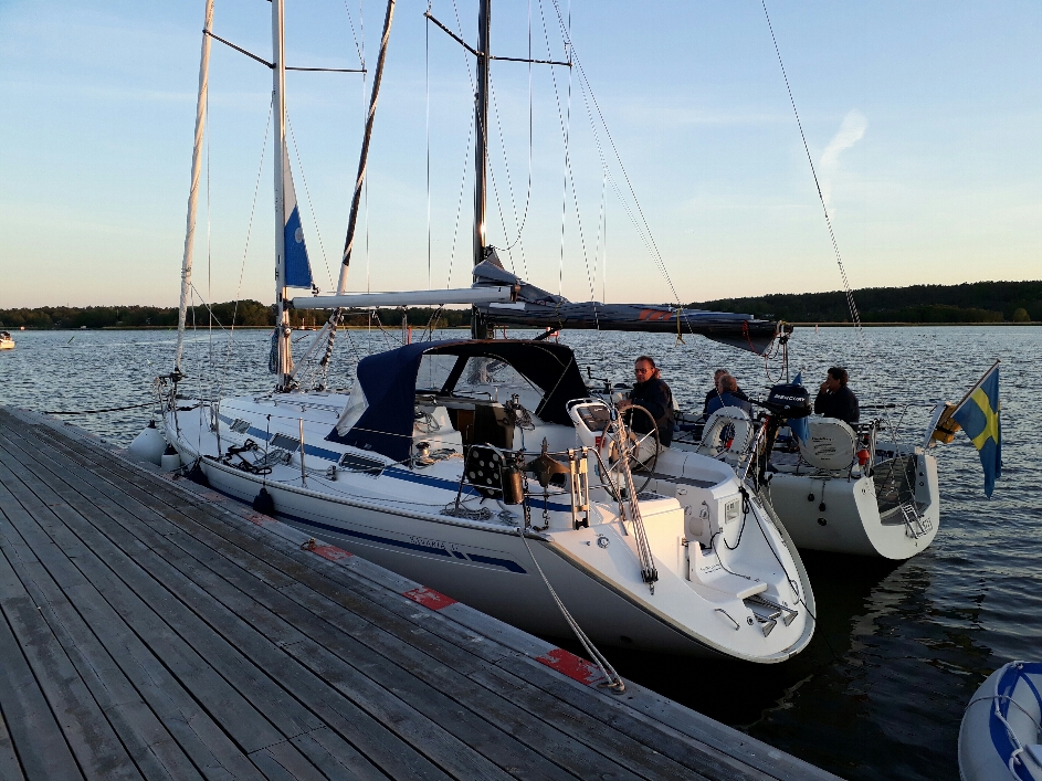 Us at pier and regatta boat longside 