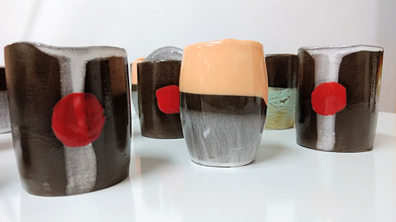 Unique handbuilt Espresso cups in black earthenware. Coloured with engobes and non-toxic glazings.