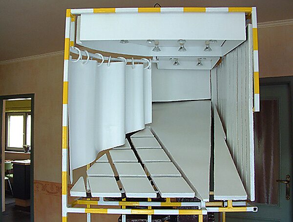 Construction with Blue — detail photograph of the white-painted interior during the working process, showing a roof structure fitted with light bulbs that were later removed from the final installation.