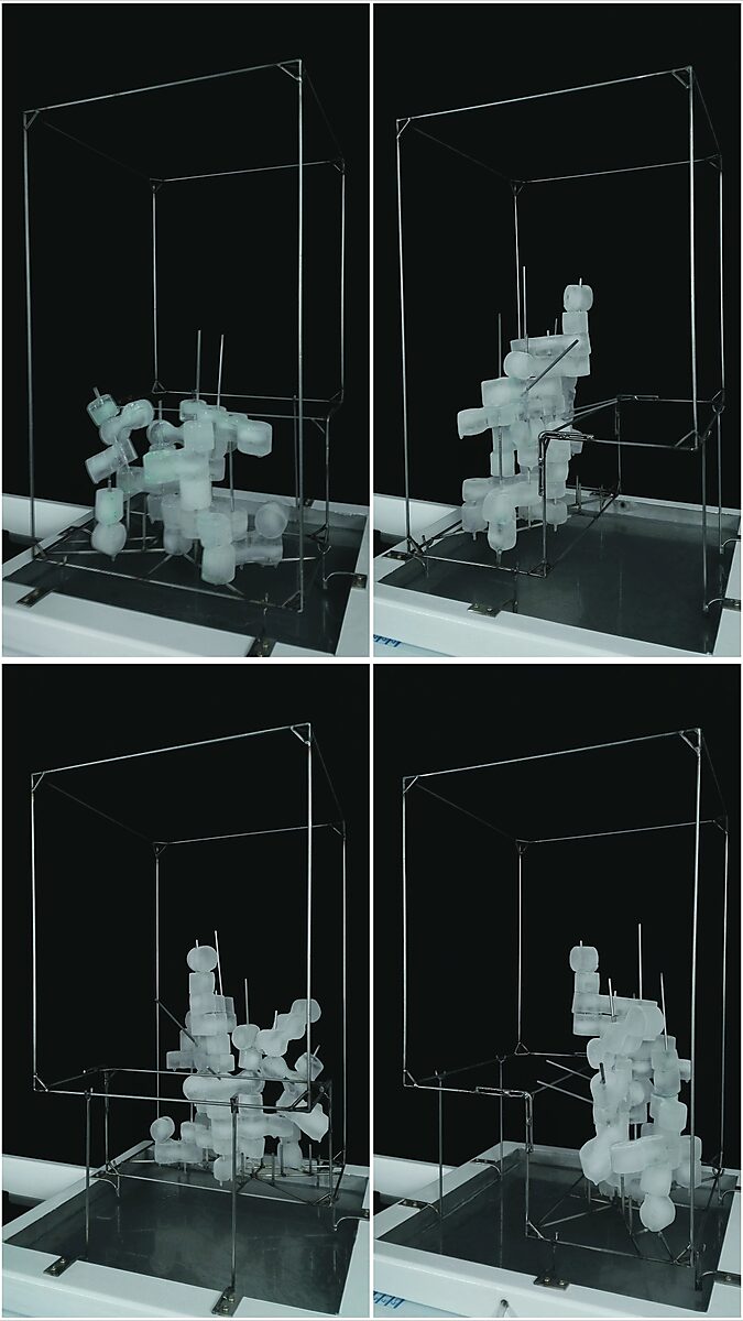 Entropic Sculpture No. 2 — videostill of the melting ice sculpture on a metal armature, shown with four views of the same recording.