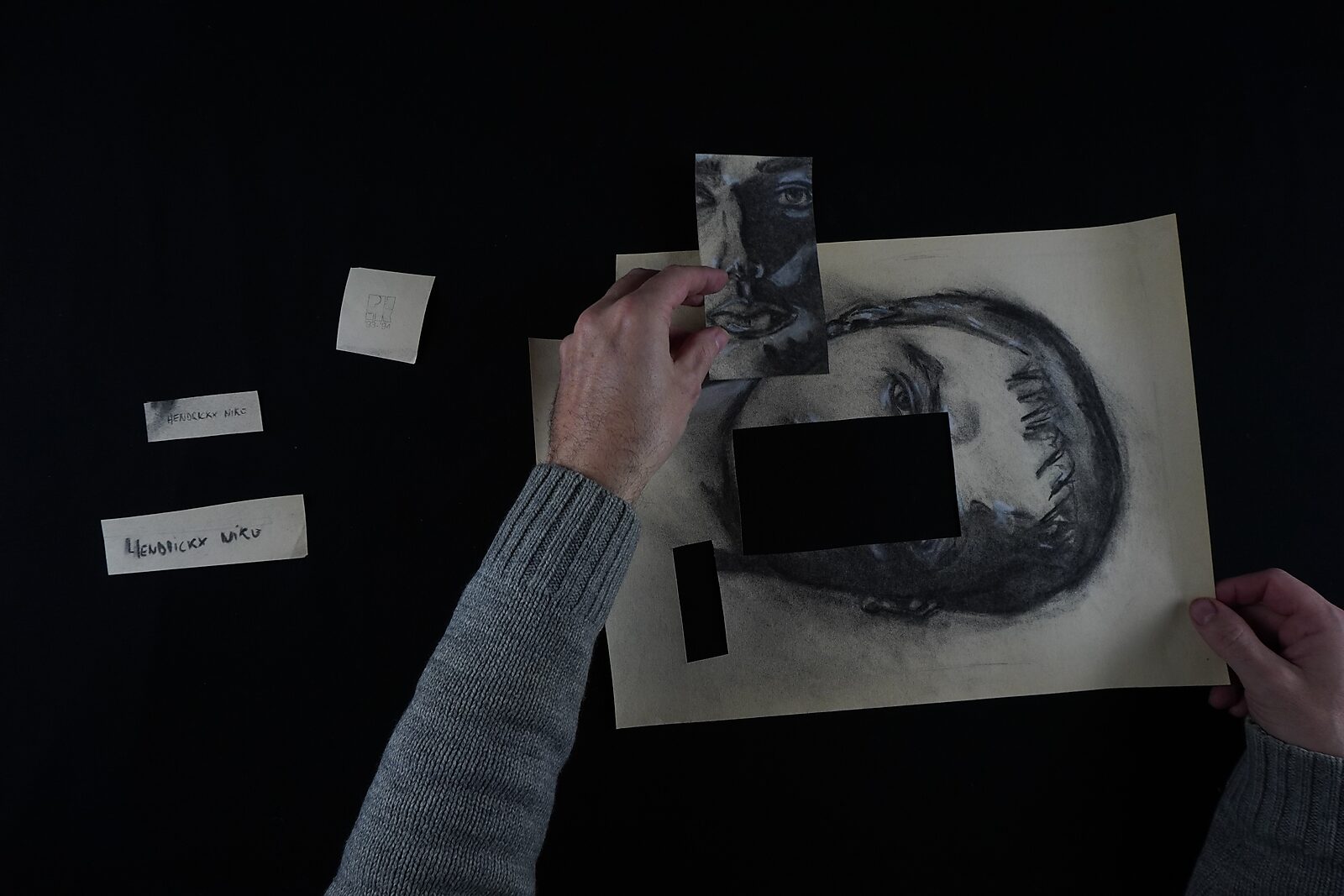 Naming–Value Butterflies — process drawing: self-portrait study 3 PHIKO (1993) — hands hold the cut-out fragment of the face above the portrait with a rectangular opening.