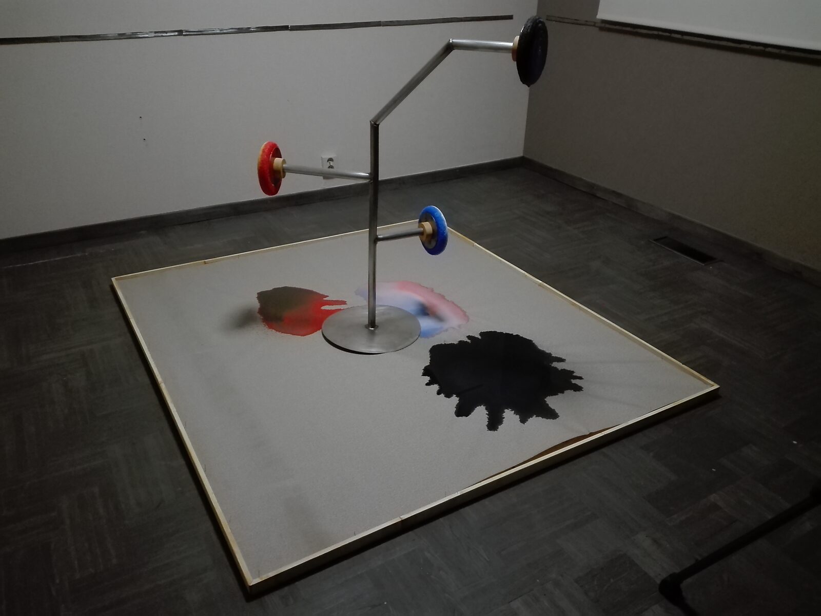 Melting Targets No. 1 — melting ice target drips red, blue and black paint onto the canvas.
