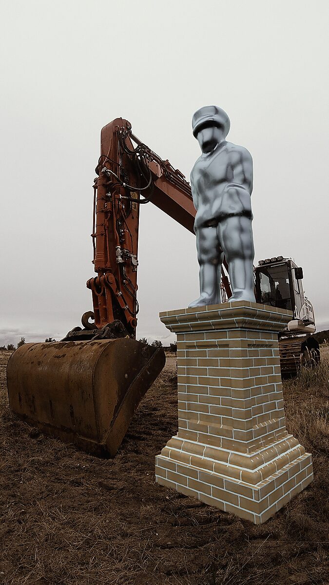 The Bending Monument — The Excavator, 3D animation videostill: on a brick pedestal a silver human monument stands upright in an open landscape, next to a large rust-brown excavator with a wide digging bucket.
